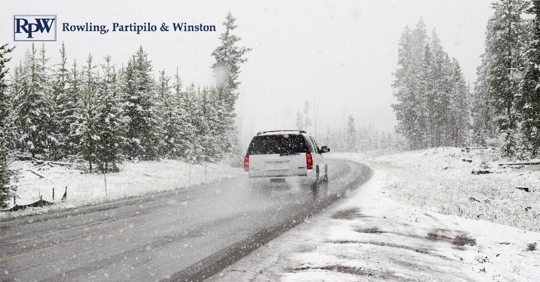 car driving while snowing