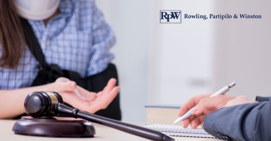 injured person talking to a lawyer